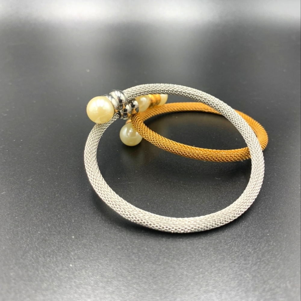 Pearl tipped bangles in gold and silver tone